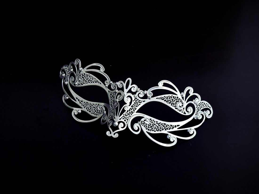 Kids silver metal masquerade mask with intricate cutout designs, perfect for costume parties and themed events.