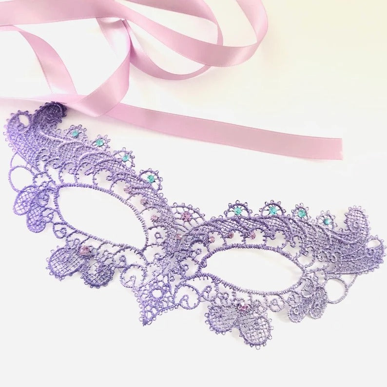 Lavender lace masquerade mask with gemstone accents and satin ties, elegant purple lace eye mask for women, perfect for masquerade, prom, and Halloween.