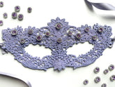 Lavender lace masquerade mask with lilac crystal rhinestones for moon ball and gala evening events.