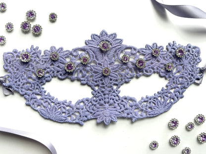 Lavender lace masquerade mask with lilac crystal rhinestones for moon ball and gala evening events.