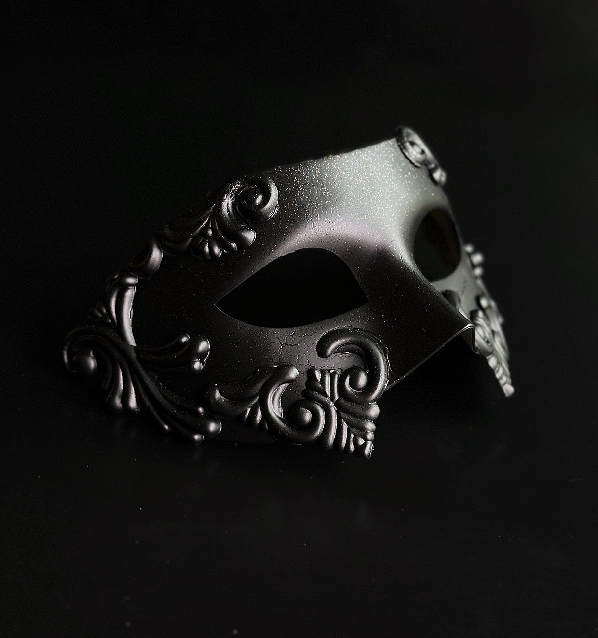 Silver and black gothic couples masquerade mask set with horned mask and metallic half mask.