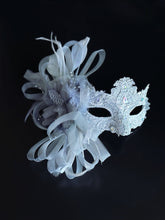 Silver lace masquerade mask with feather and crystal detail for weddings, galas, and formal masquerade events.