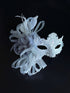 Silver lace masquerade mask with feather and crystal detail for weddings, galas, and formal masquerade events.