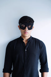 Men’s black masquerade mask with matte finish for elegant parties.