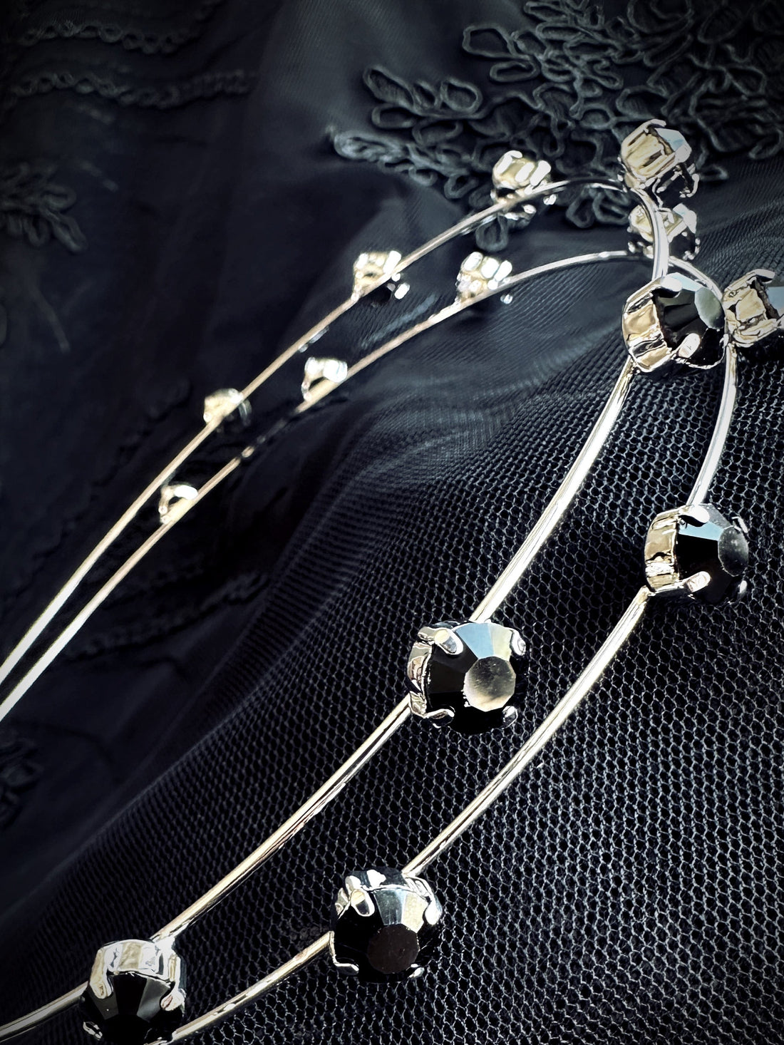 Silver headband with black crystals