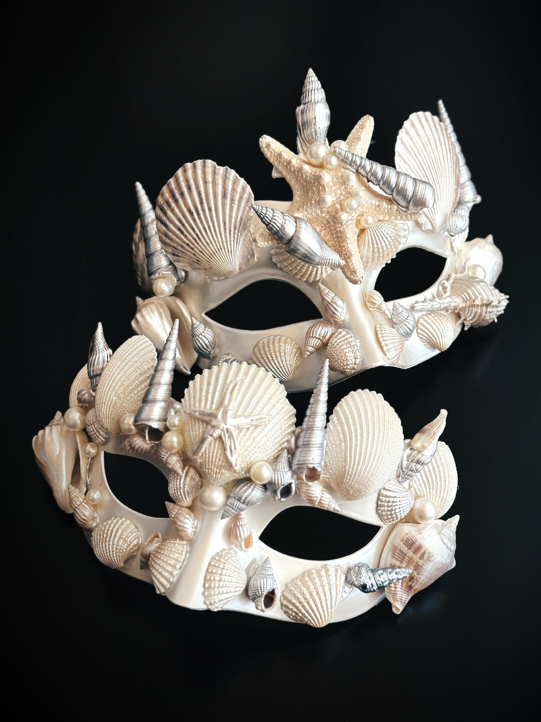 Ivory shell masquerade couples mask set with mermaid starfish and pearl details.