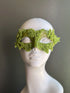 Handcrafted olive green floral lace masquerade mask featuring embroidered lace appliqués and decorative beadwork on a satin base, designed for Venetian masquerade balls, Mardi Gras, cosplay, weddings, galas, and elegant costume events.