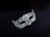 Ornate silver metal masquerade mask for kids with intricate filigree designs, ideal for costume parties and special events.