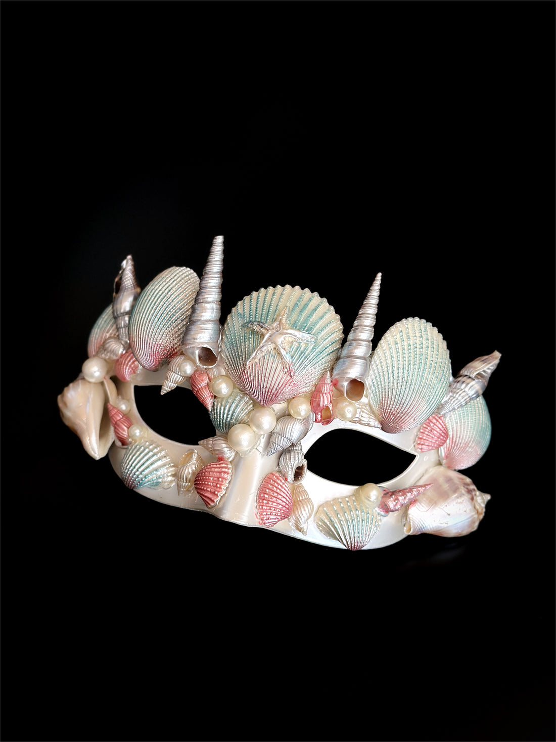 Mermaid masquerade mask with pastel pink, mint, and pearl seashells in a dreamy ocean theme.