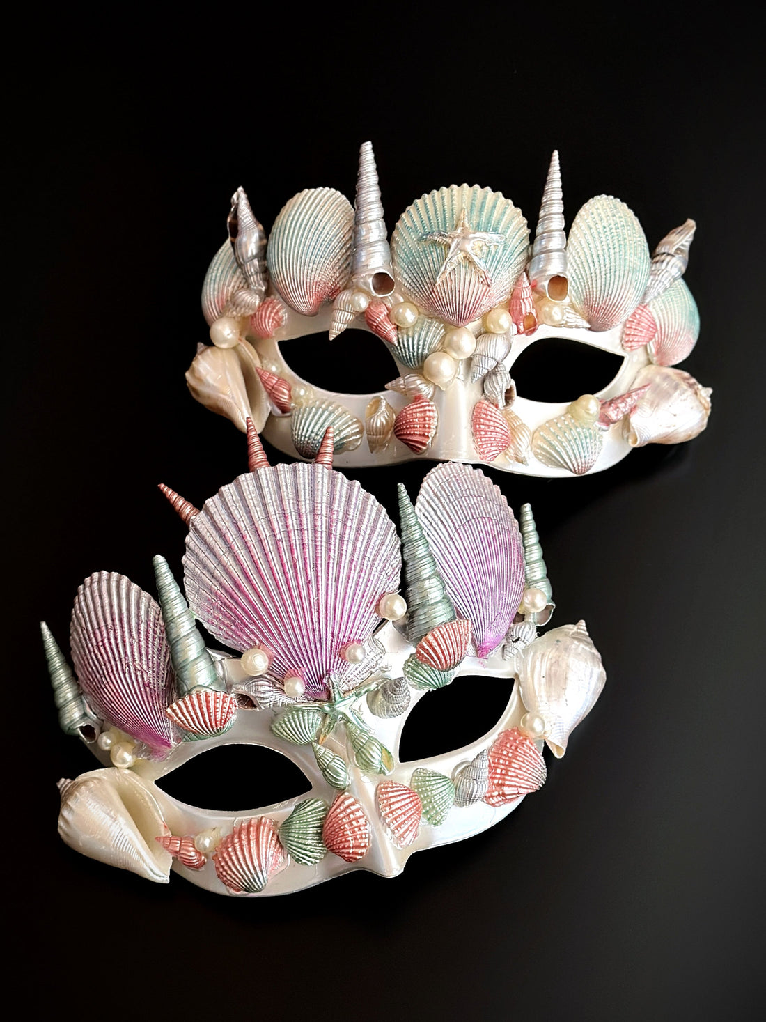 Mermaid masquerade mask with pastel pink, mint, and pearl seashells in a dreamy ocean theme.