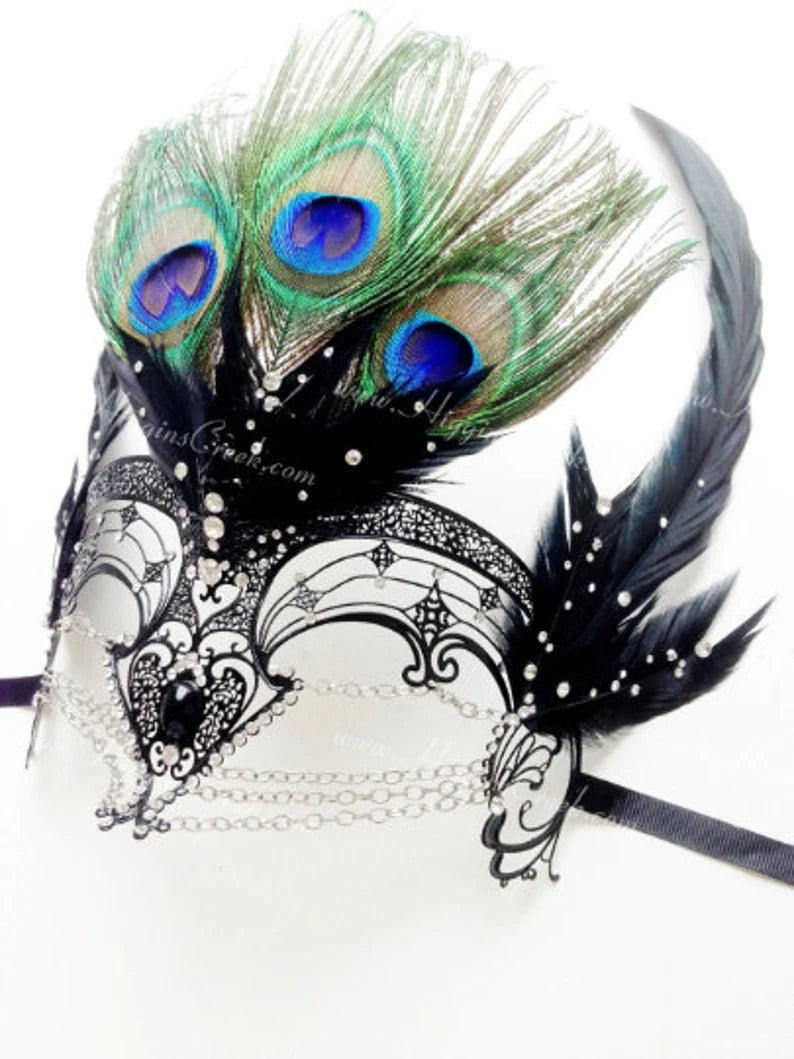 Black filigree mask with rhinestones and peacock feathers, ideal for prom, Mardi Gras, and masquerade ball.