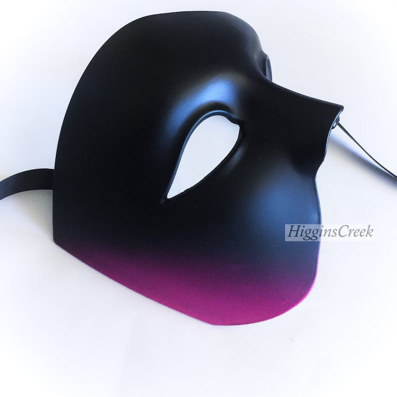 Black and magenta gradient Phantom of the Opera masquerade mask, half-face design for theater, Carnival, and Halloween.