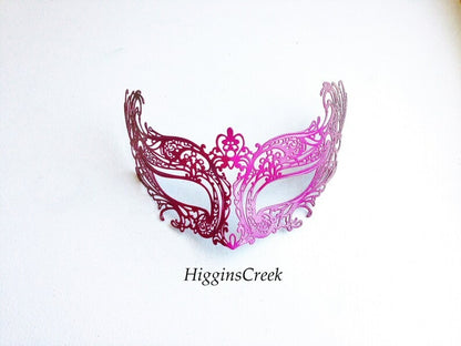 Ombre masquerade mask in metallic pink and purple filigree cut-out design.