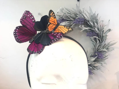 Monarch butterfly headband with purple and orange accents for cosplay and festivals.