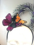 Monarch butterfly headband with purple and orange accents for cosplay and festivals.