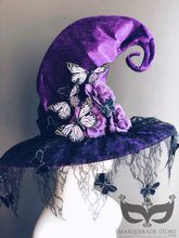 Purple witch hat with lace trim and butterfly embellishments, perfect for Halloween or costume parties.