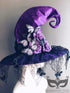 Purple witch hat with lace trim and butterfly embellishments, perfect for Halloween or costume parties.
