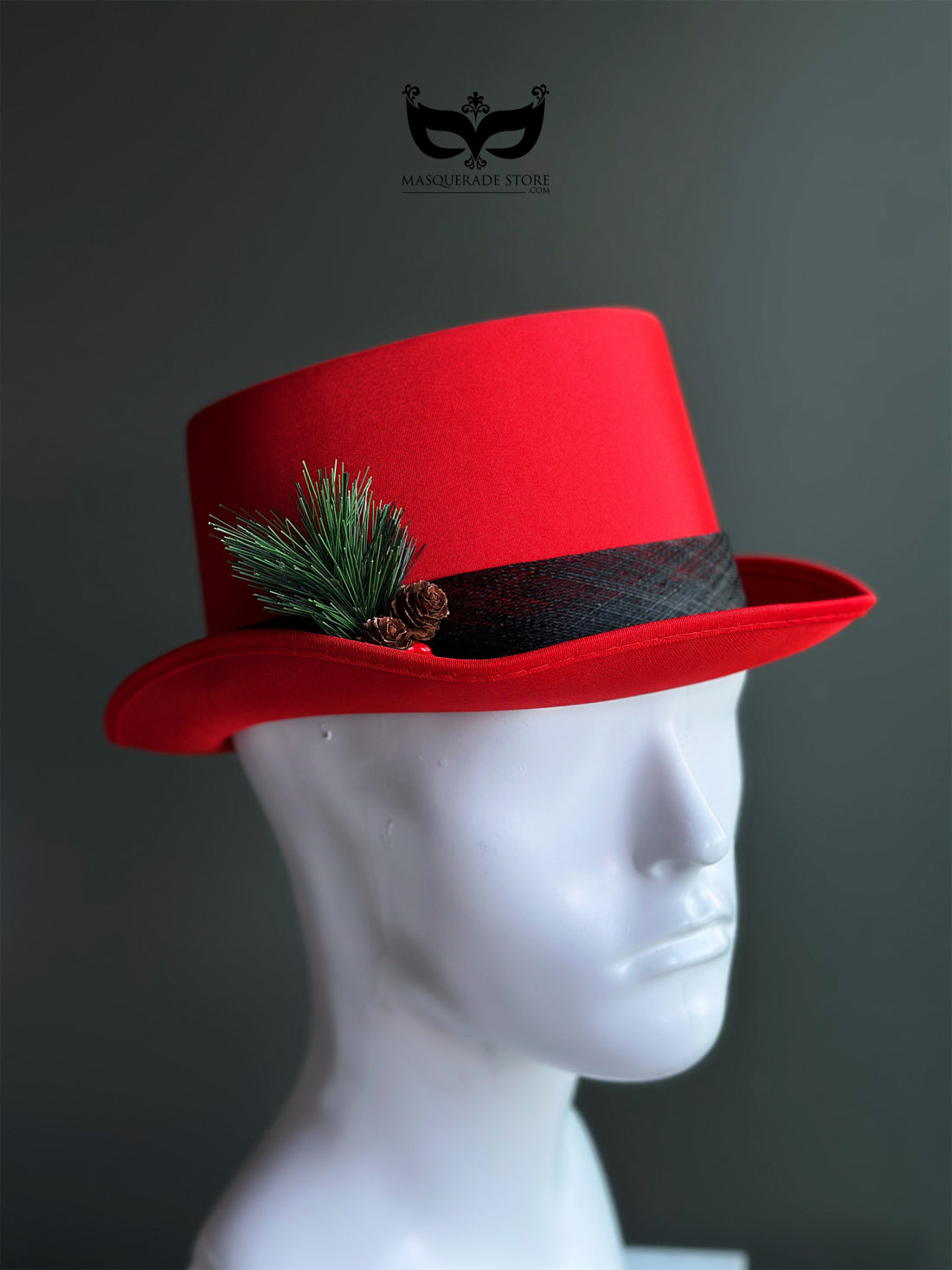 Red Christmas top hat with pine greenery pinecone accent for holiday outfits and winter parties