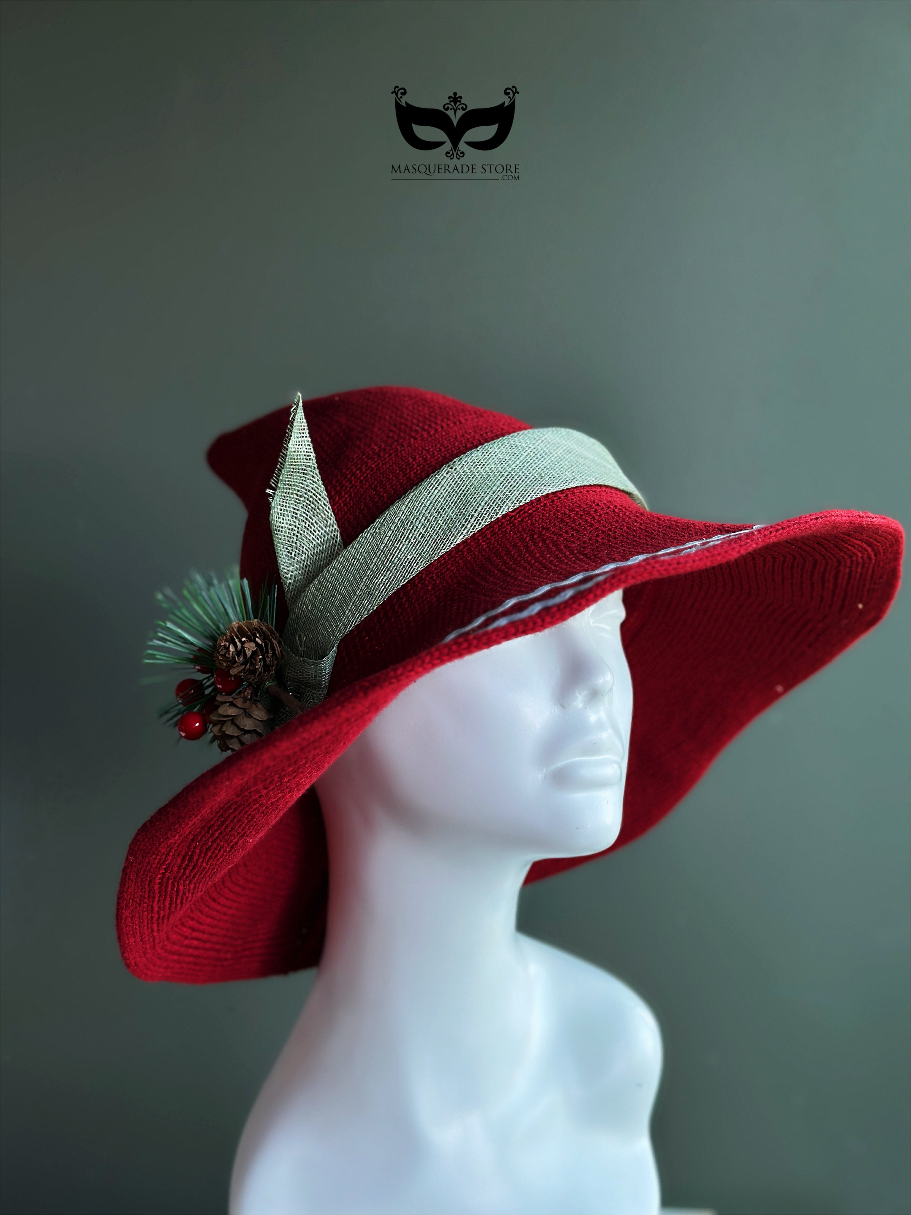 Red Christmas wide brim hat with pine greenery pinecones berries and ribbon holiday accent