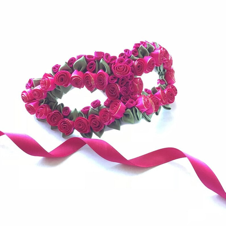 Hot pink rose bouquet masquerade mask with floral design and green leaf accents for women.