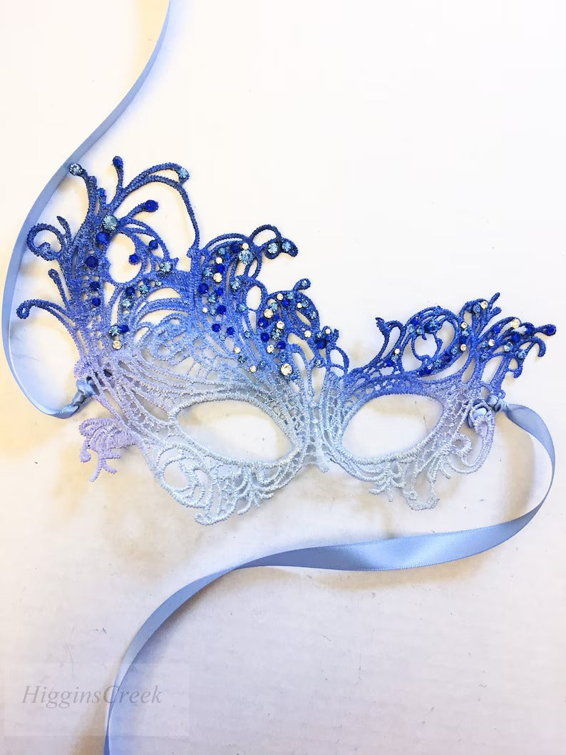 Elegant silver and blue ombré lace masquerade mask with rhinestones, perfect for prom or Venetian ball.