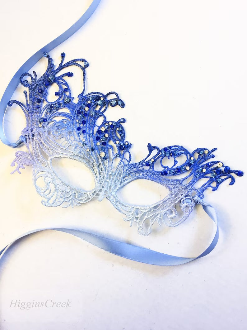 Elegant silver and blue ombré lace masquerade mask with rhinestones, perfect for prom or Venetian ball.