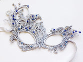 Elegant silver lace masquerade mask with blue rhinestones, ideal for Venetian parties, proms, or weddings.
