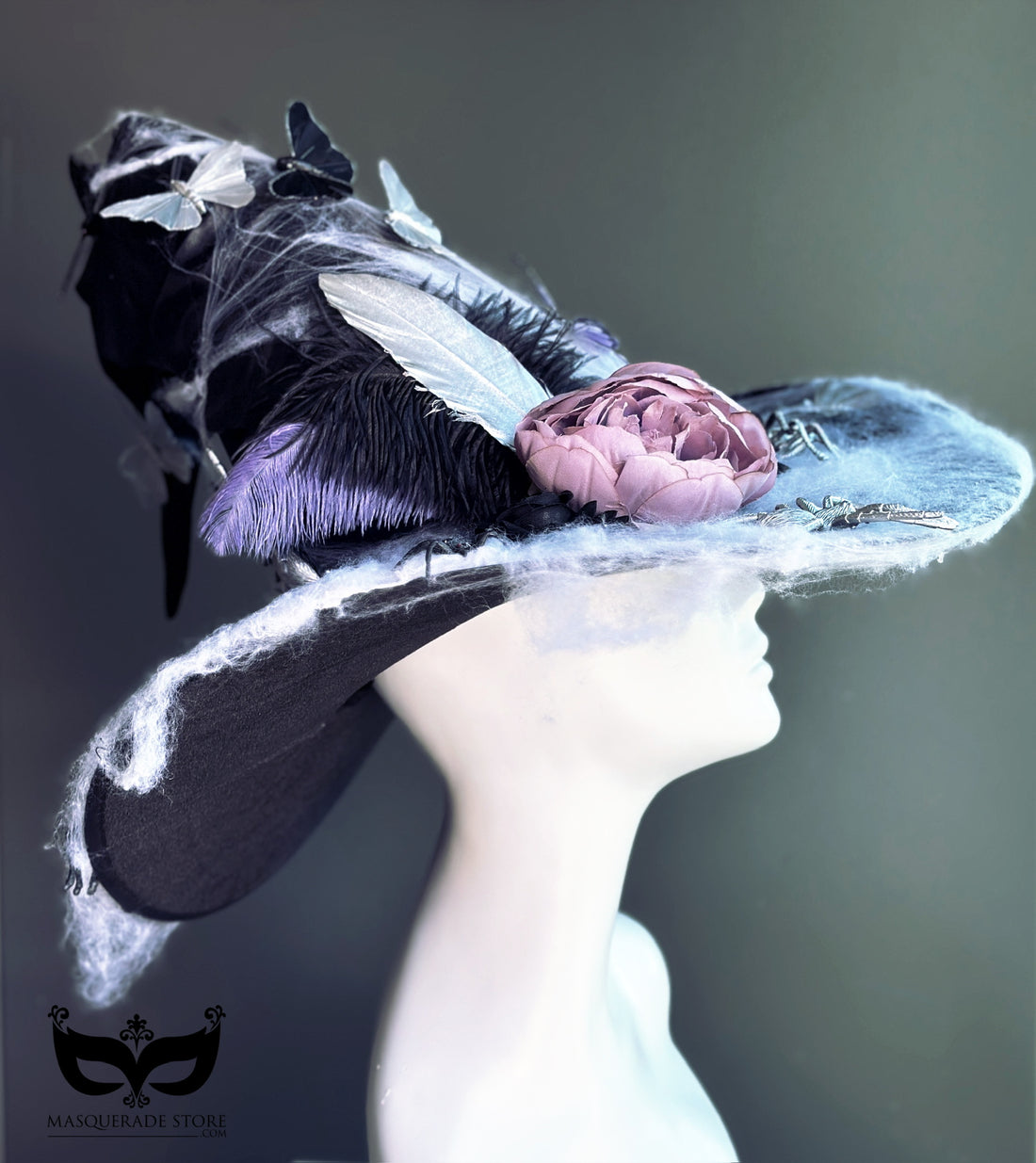 Halloween witch hat with cobwebs, butterflies, spiders, and black-pink floral detail for costume or masquerade