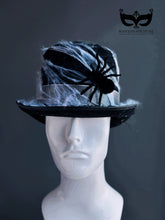 Black spider Halloween fedora with faux web details, creepy costume hat for parties or haunted looks