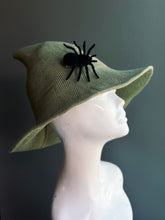 green witch hat with removable black spider accent clip for halloween