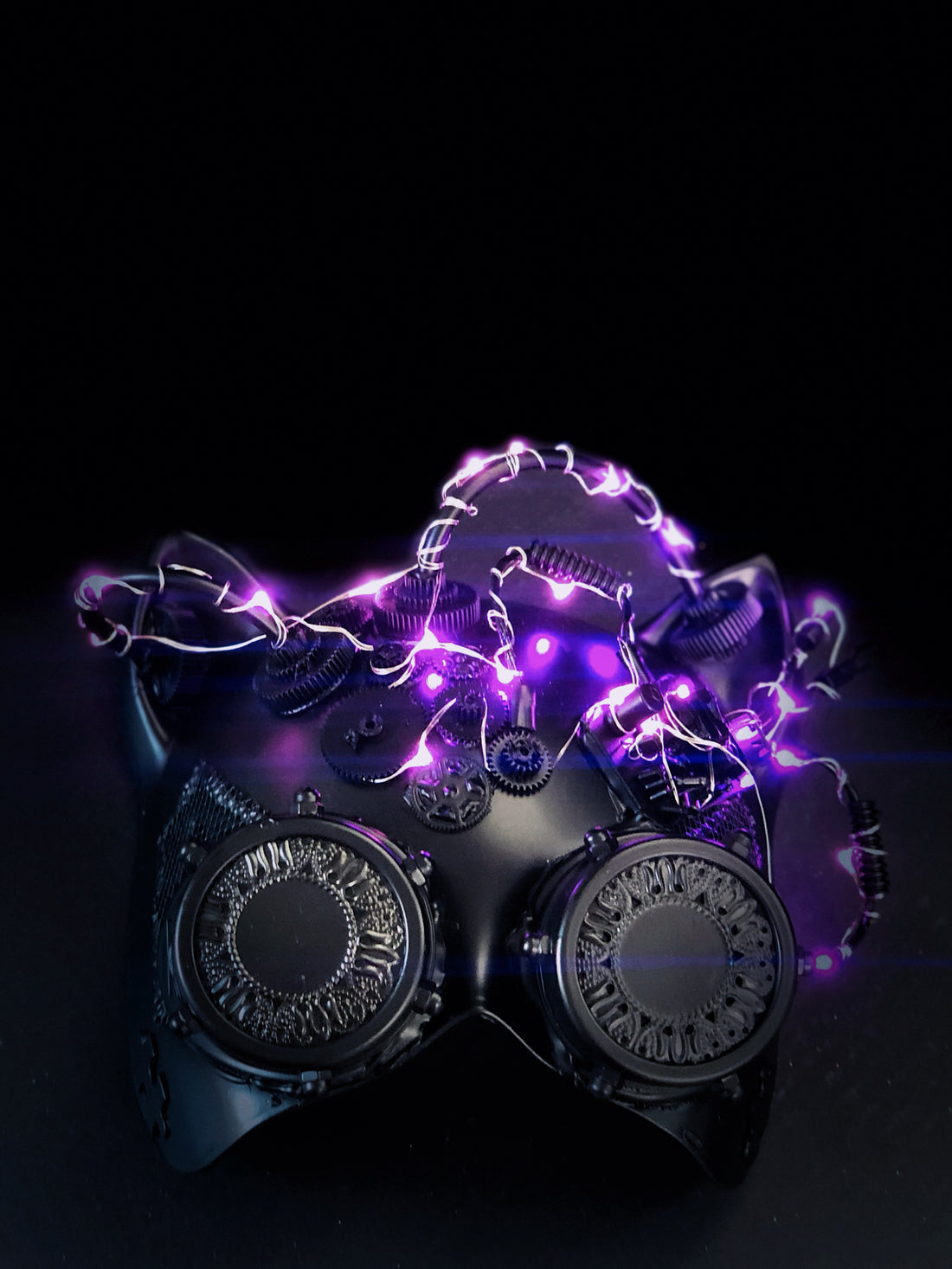 Steampunk Cat Mask with purple LED lights and gear detailing.