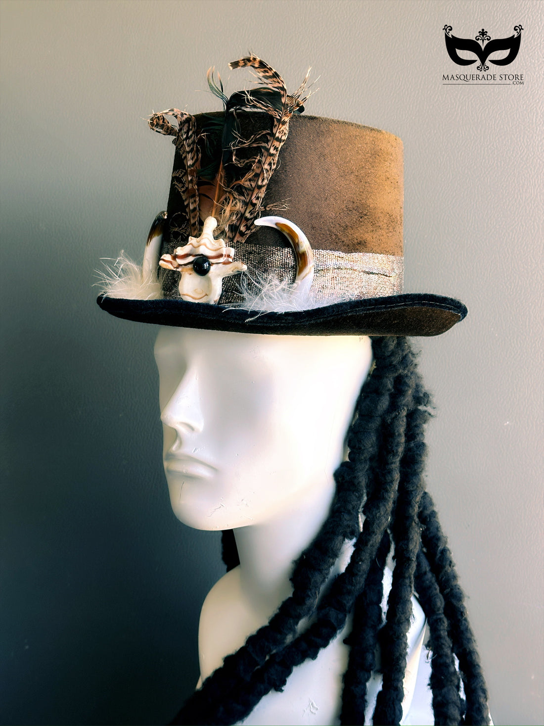 Tribal voodoo shaman hat decorated with feathers, horns, and shell talisman, perfect for costumes, rituals, or theatrical performances.