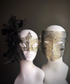 Elegant black and gold couples masquerade masks with floral and full-face baroque designs

