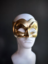 Gold Venetian Devil Mask with a sculpted, dramatic expression displayed on a mannequin.


