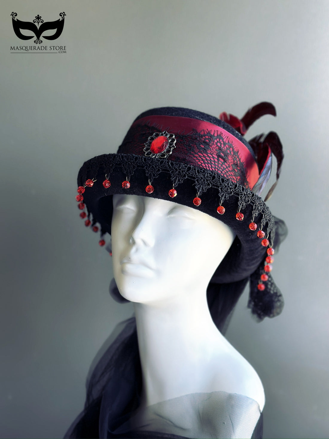 Gothic Victorian black and red feather fascinator hat with lace trim, satin ribbon, and tulle veil