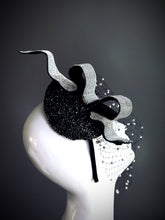 Black rhinestone fascinator hat with dramatic crystal veil and vintage ribbon detail

