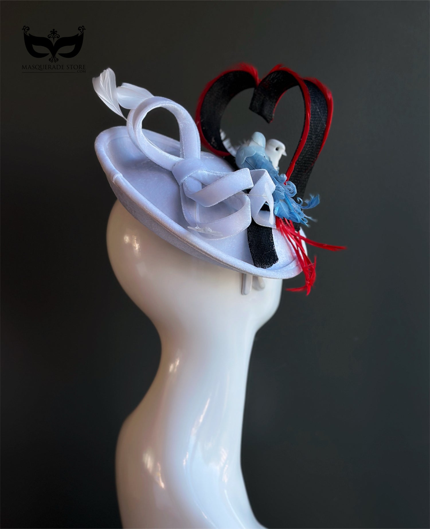 Love birds themed fascinator hat with feathers and red accents