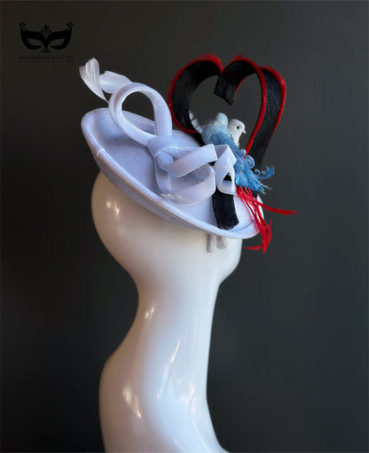 Love birds themed fascinator hat with feathers and red accents