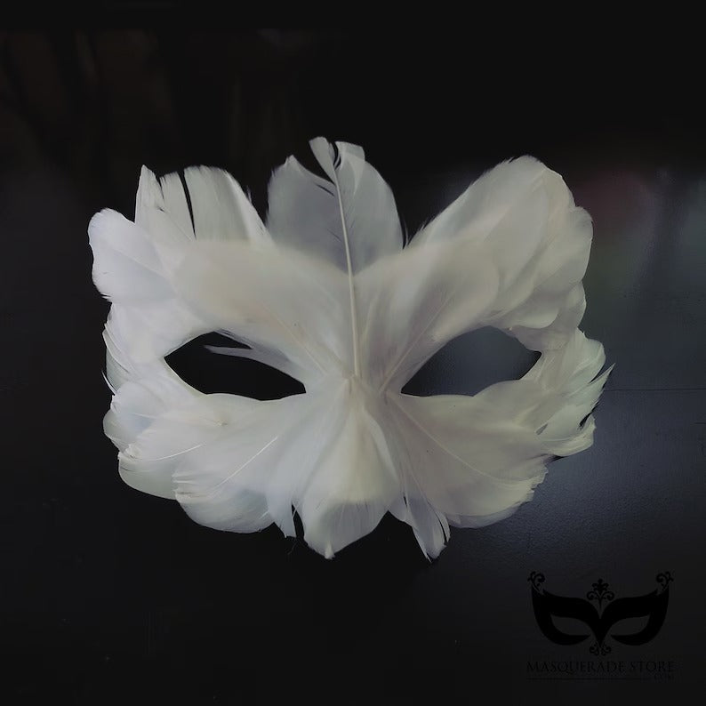 Celeste white feather masquerade mask with angelic Venetian-inspired design, perfect for weddings and elegant parties.