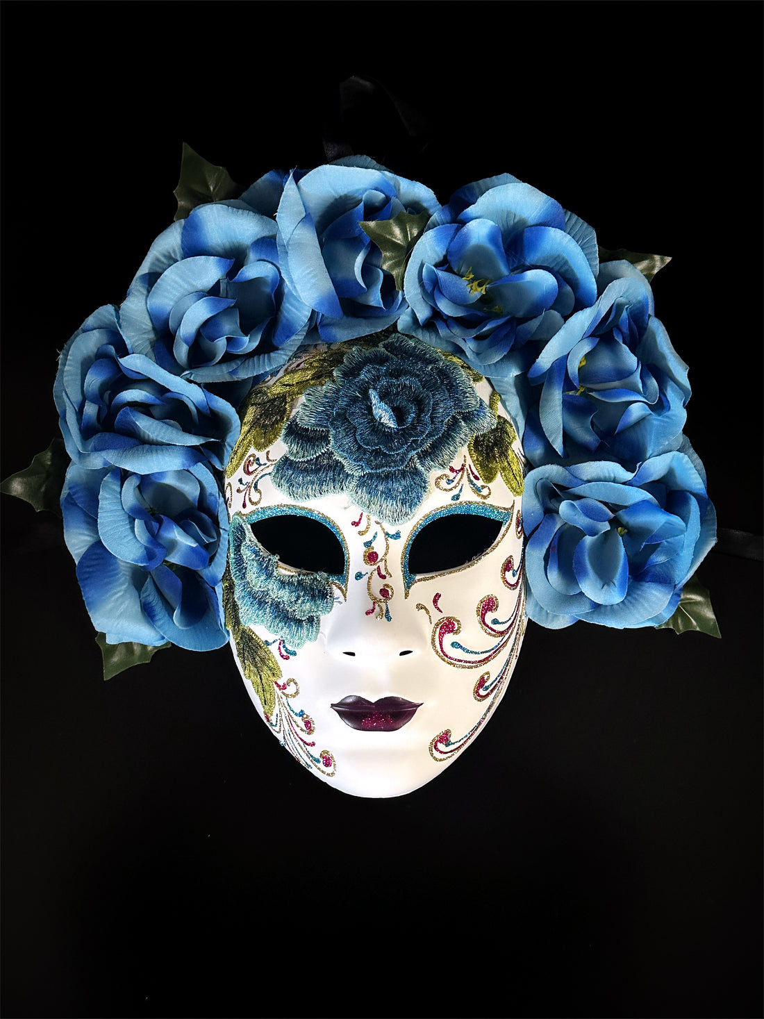 white catrina mask with blue satin roses and foliage