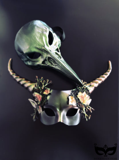 Couples green plague crow mask and floral horn masquerade mask with moss accents