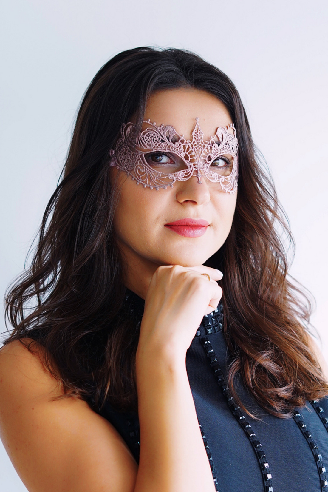 Rose gold lace masquerade mask.