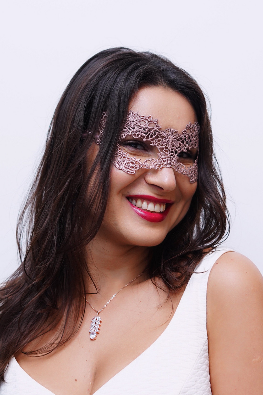 Rose gold lace masquerade mask.