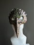 Woodland plague crow masquerade mask with beak design, green and bronze leaf texture, fantasy gothic costume accessory
