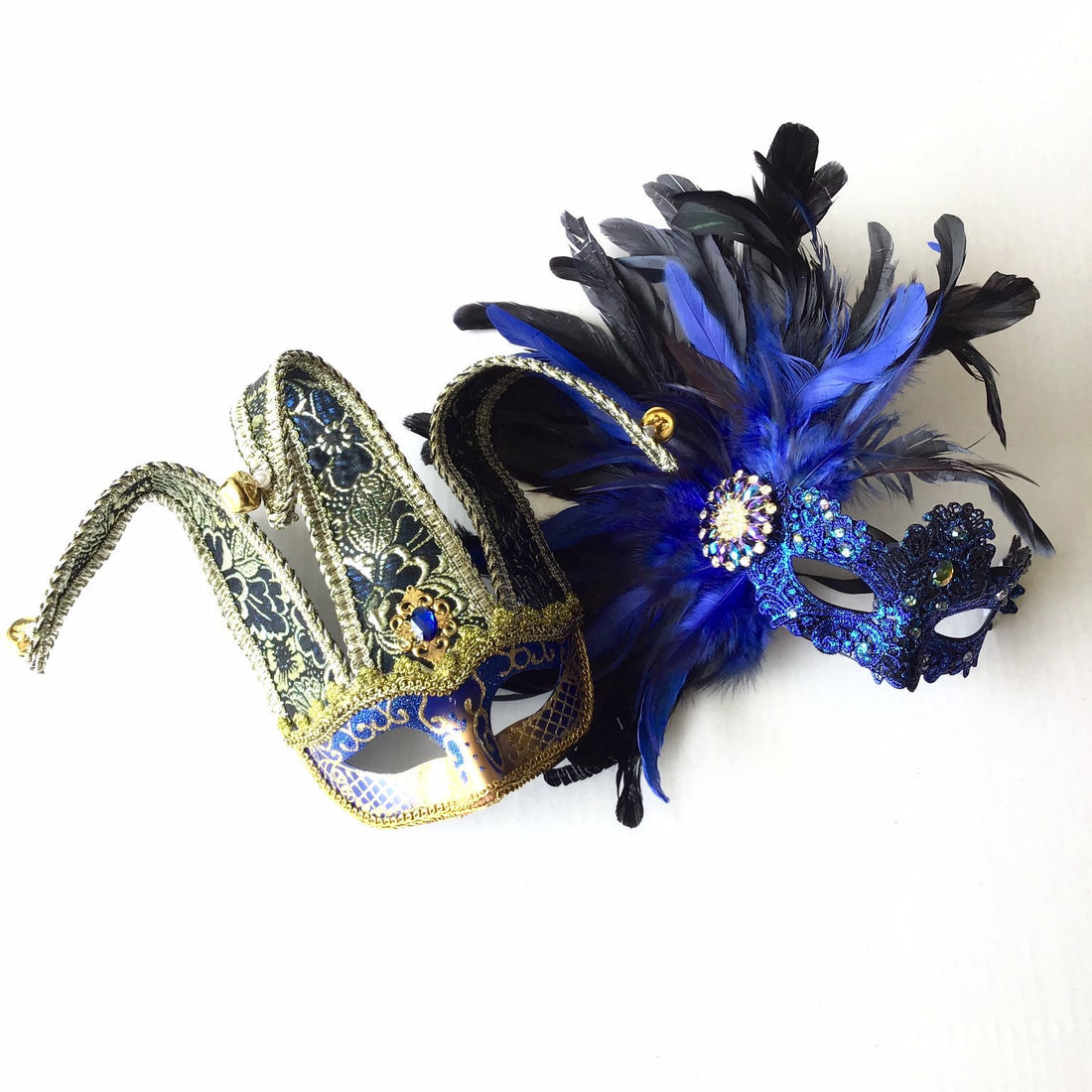 Elegant masquerade mask set with jester bells and rhinestone blue feathers—perfect for Mardi Gras couples