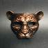 Metallic copper animal face mask with panther shape for jungle or fantasy masquerade events