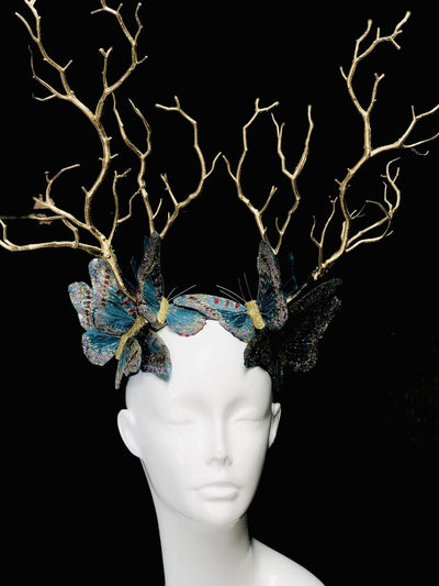Whimsical woodland crown featuring golden branches and butterflies for festivals or costumes
