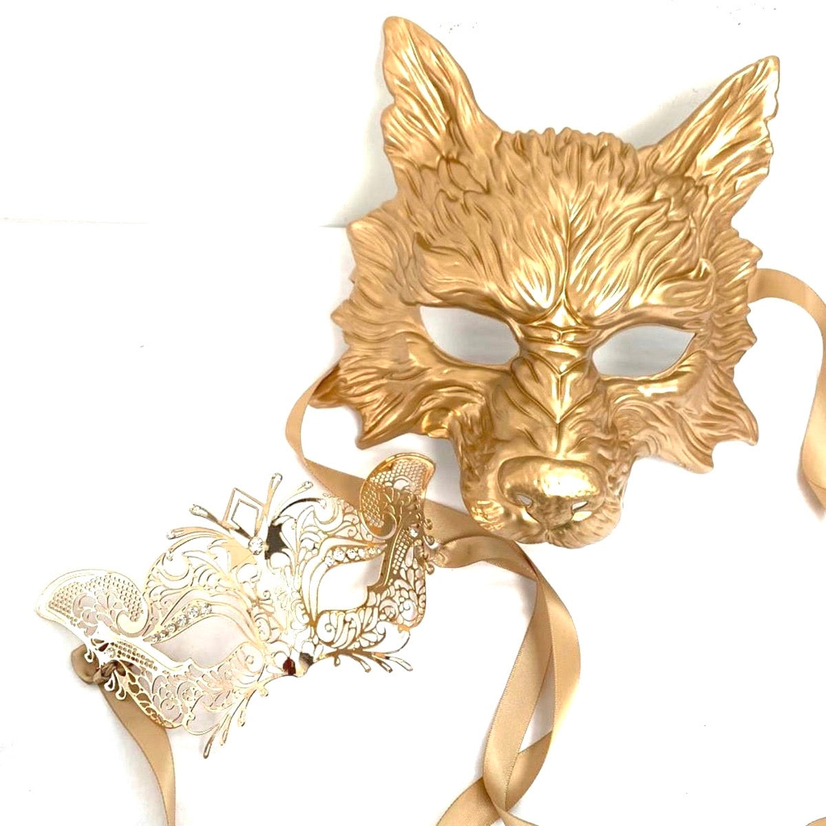 Gold wolf and fox masquerade masks for father and daughter.