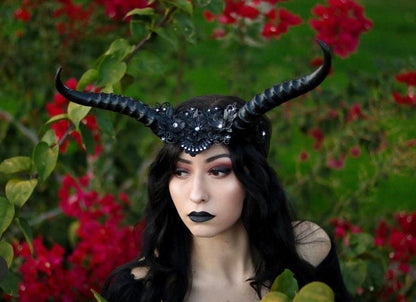 Womens long horned mythical creature headdress in black.