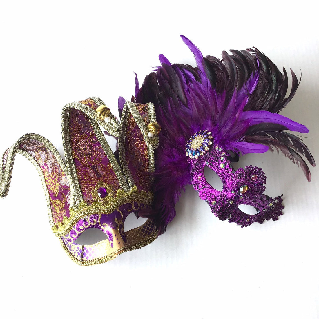 Couples mardi gras jester masquerade mask set in purple and gold.